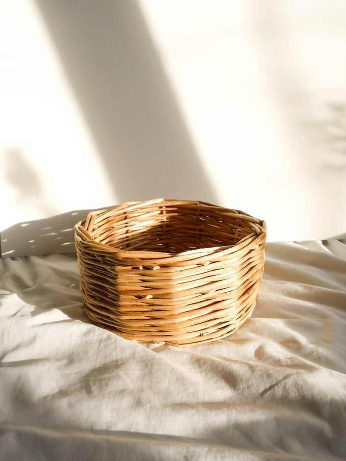 Small natural blond wicker basket